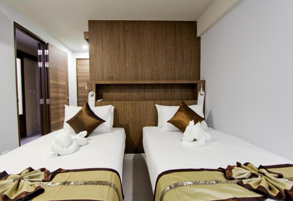 Elegancy Sansabai Hotel Patong Exterior photo