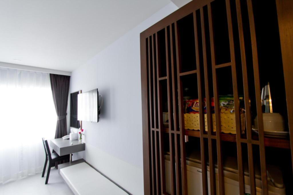Elegancy Sansabai Hotel Patong Exterior photo