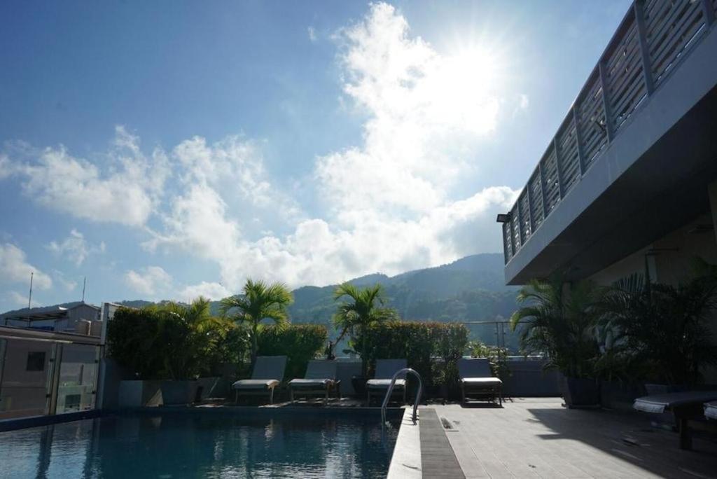 Elegancy Sansabai Hotel Patong Exterior photo